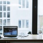 office desk facing window productivity debate